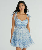 You'll be the best dressed in the Brynne Formal Floral Mesh Ruffled Skater Dress as your summer formal dress with unique details from Windsor.