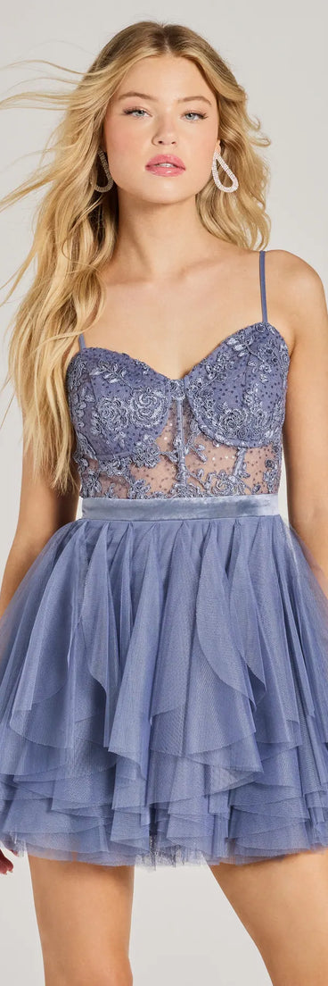 The Jodie Corset Ruffle Tulle Skater Party Dress is a mini dress that will make a statement with its short hemline and on-trend details to have you ready for any event!