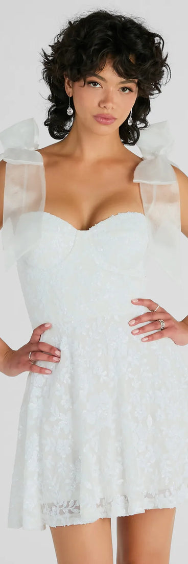 Revamp your 2025 wardrobe with this chic addition, the Amanda Tulle Bow Strap Sequin A-Line Party Dress in white, perfect for elevating your style in the new year.