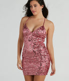 Turn heads in the beaming Abby Lace-Up Sequin Satin Party Dress, a stunning mauve sequin dress designed to add sparkle and elegance to your next night out or special occasion.