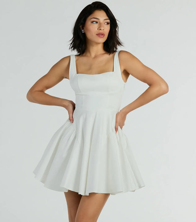 Step into seasonal chic with the Brenda Low Back Bow Taffeta Skater Dress, a white mini dress featuring an above-the-knee cut ideal for cocktail parties, festive gatherings, or clubwear.