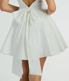 Revamp your 2025 wardrobe with this chic addition, the Brenda Low Back Bow Taffeta Skater Dress in white, perfect for elevating your style in the new year.