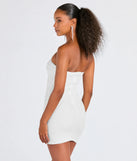 Make a bold statement in the Lena Strapless Bodycon Beaded Mesh Mini Dress in white, the perfect spring dress for weddings, cocktail hours, nights out, and/or seasonal celebrations.
