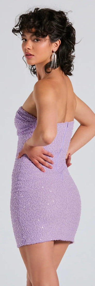 Flaunt your silhouette in the tight Lena Strapless Bodycon Beaded Mesh Mini Dress in lavender, a bodycon dress that empowers your look with bold style and effortless edge.