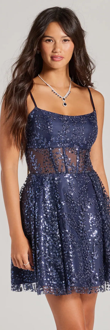 Turn heads in the beaming Angelica Lace-Up Corset Glitter Tulle Skater Dress, a stunning multicolor sequin dress designed to add sparkle and elegance to your next night out or special occasion.
