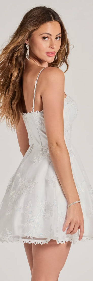 Own the evening in the Chloe Sequin Embroidered Mesh Skater Dress in white, a fall cocktail dress perfect for rooftop parties and stylish soirées.