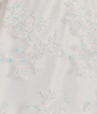 The Chloe Sequin Embroidered Mesh Skater Dress is a stylish white floral dress featuring a fresh seasonal print and flattering design, perfect for garden parties, bridal showers, Valentine's Day celebrations, or everyday summer styling.