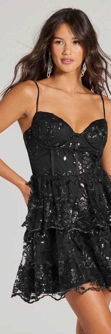 Turn heads in the beaming Andrea Corset Floral Embroidered A-Line Party Dress, a stunning black sequin dress designed to add sparkle and elegance to your next night out or special occasion.