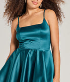 Revamp your 2025 wardrobe with this chic addition, the Haidie Sleeveless A-Line Satin Party Dress in emerald green, perfect for elevating your style in the new year.