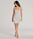 The Sophie Scoop Neck Rhinestone Faux Pearl Mini Dress is a mini dress that will make a statement with its short hemline and on-trend details to have you ready for any event!