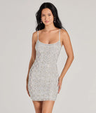 Own every entrance in the Sophie Scoop Neck Rhinestone Faux Pearl Mini Dress, a white party dress perfect for milestone birthdays and grad parties, or dancing through summer nights and unforgettable bachelorette celebrations.