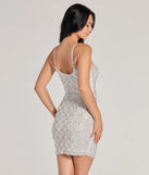 Make a bold statement in the Sophie Scoop Neck Rhinestone Faux Pearl Mini Dress in white, the perfect spring dress for weddings, cocktail hours, nights out, and/or seasonal celebrations.