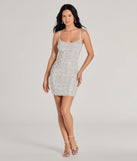 Own every entrance in the Sophie Scoop Neck Rhinestone Faux Pearl Mini Dress, a white party dress perfect for milestone birthdays and grad parties, or dancing through summer nights and unforgettable bachelorette celebrations.