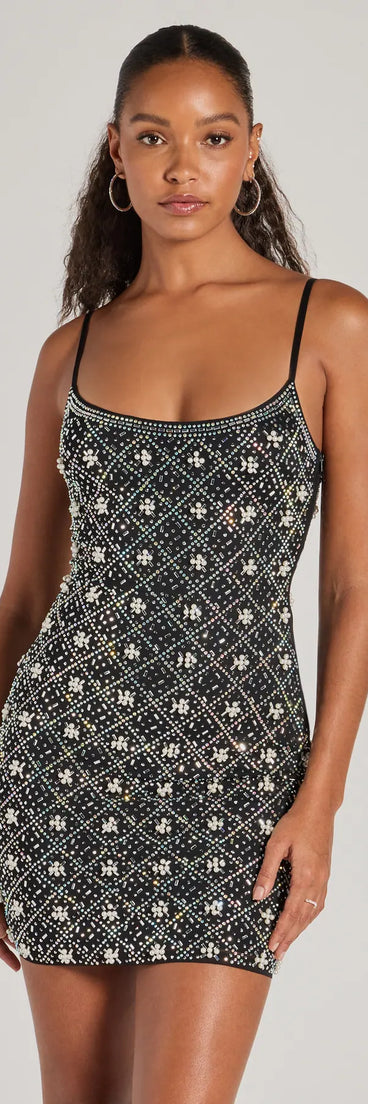 The Sophie Scoop Neck Rhinestone Faux Pearl Mini Dress is a mini dress that will make a statement with its short hemline and on-trend details to have you ready for any event!