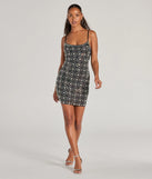 Make a bold statement in the Sophie Scoop Neck Rhinestone Faux Pearl Mini Dress in black, the perfect summer dress for weddings, cocktail hours, nights out, and/or seasonal celebrations.