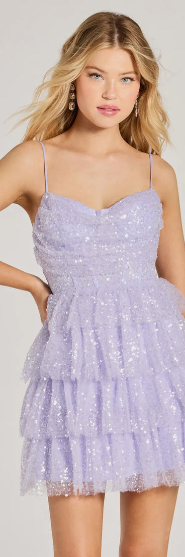 Turn heads in the beaming Jessica Corset Ruffled Sequin Tulle Party Dress, a stunning lavender sequin dress designed to add sparkle and elegance to your next night out or special occasion.