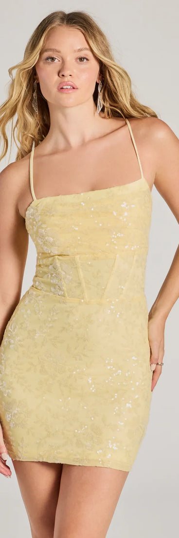 Turn heads in the beaming Abigail Cowl Neck Corset Lace-Up Sequin Party Dress, a stunning yellow sequin dress designed to add sparkle and elegance to your next night out or special occasion.