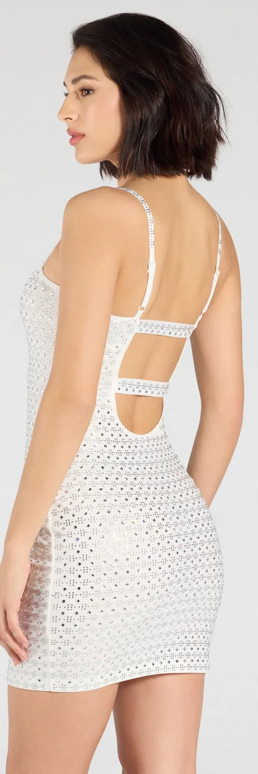 Flaunt your silhouette in the tight Farah Strappy Back Rhinestone Mini Dress in white, a bodycon dress that empowers your look with bold style and effortless edge.