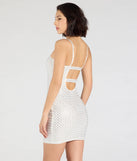 Flaunt your silhouette in the tight Farah Strappy Back Rhinestone Mini Dress in white, a bodycon dress that empowers your look with bold style and effortless edge.