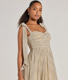 You'll look stunning in the Marnie Sweetheart Tie Strap Polka Dot Formal Midi Dress, a beige formal dress designed to create an effortless yet standout look as women's formal holiday attire, work party outfit, or NYE dress.