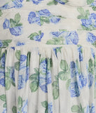 The Clara Sweetheart Floral Chiffon Midi Formal Dress is a light blue dress, an essential holiday or NYE dress that pairs chic style with versatility making it perfect for cocktail events, New Year's Eve parties, or as a winter wedding guest look.
