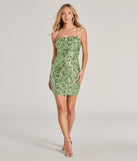 Make a bold statement in the Brynlee Sequin Embroidered Bodycon Dress in sage green, the perfect green dress for weddings, cocktail hours, nights out, and/or seasonal celebrations.
