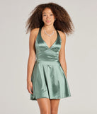 The Taylor Lace-Up Skater Satin Party Dress is a mini dress that will make a statement with its short hemline and on-trend details to have you ready for any event!