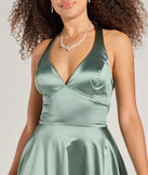 Revamp your 2025 wardrobe with this chic addition, the Taylor Lace-Up Skater Satin Party Dress in sage green, perfect for elevating your style in the new year.
