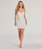 The Eve Lace-Up Beaded Sequin Bodycon Mini Dress is a dazzling white sequin dress, perfect for making a bold entrance at any event, from cocktail parties to formal celebrations.