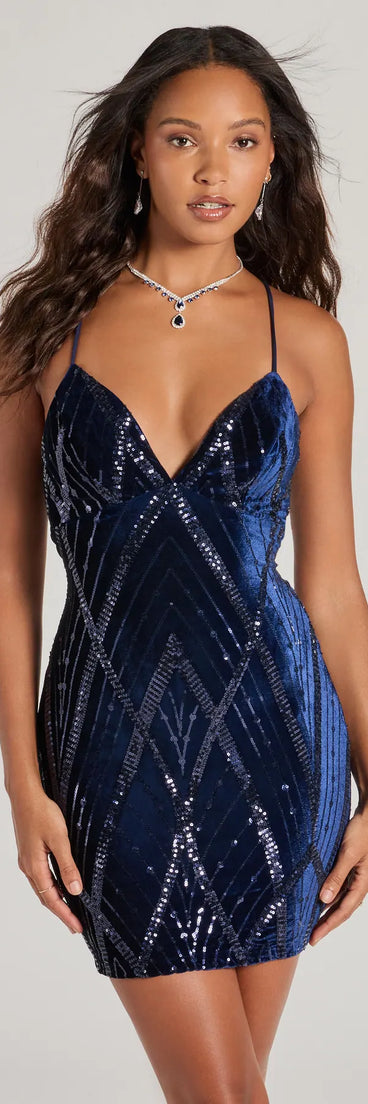 Own every entrance in the Heather Lace-Up Sequin Velvet Mini Dress, a navy blue party dress perfect for milestone birthdays, homecoming dances, and unforgettable bachelorette celebrations.