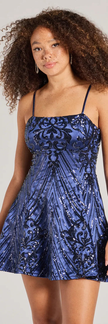 Turn heads in the beaming Carter Lace-Up Sequin A-Line Party Dress, a stunning navy sequin dress designed to add sparkle and elegance to your next night out or special occasion.