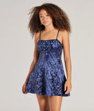 Turn heads in the beaming Carter Lace-Up Sequin A-Line Party Dress, a stunning navy sequin dress designed to add sparkle and elegance to your next night out or special occasion.