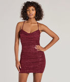 Step into seasonal chic with the Angie Rhinestone Strap Open Back Glitter Mini Dress, a wine mini dress featuring an above-the-knee cut ideal for cocktail parties, festive gatherings, or clubwear.