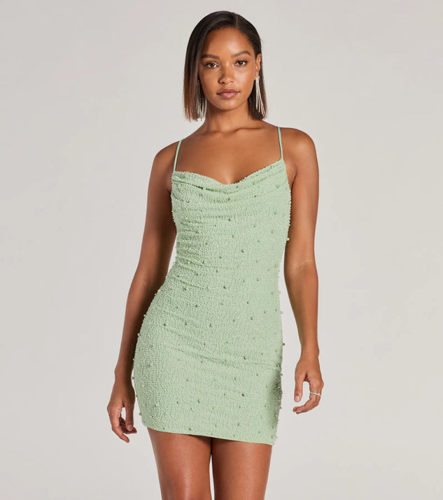 The Keira Faux Pearl Strappy Open-Back Mini Dress is a mini dress that will make a statement with its short hemline and on-trend details to have you ready for any event!