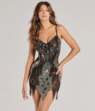 Step into winter chic with the Jungle Cutie Rhinestone Beaded Mini Dress, a black mini dress featuring an above-the-knee cut ideal for cocktail parties, festive gatherings, or clubwear.