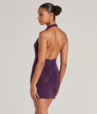 Flaunt your silhouette in the tight Piper Halter Bodycon Rhinestone Mini Dress in purple, a bodycon dress that empowers your look with bold style and effortless edge.