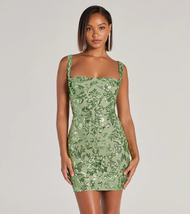 Turn heads in the beaming Aubree Lace-Up Sequin Party Dress, a stunning sage sequin dress designed to add sparkle and elegance to your next night out or special occasion.