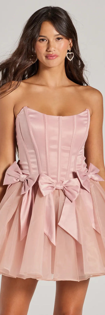 The Jaimie Strapless Corset Bow A-Line Party Dress is a mini dress that will make a statement with its short hemline and on-trend details to have you ready for any event!