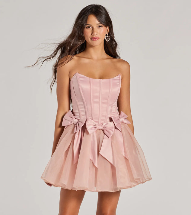 The Jaimie Strapless Corset Bow A-Line Party Dress is a mini dress that will make a statement with its short hemline and on-trend details to have you ready for any event!