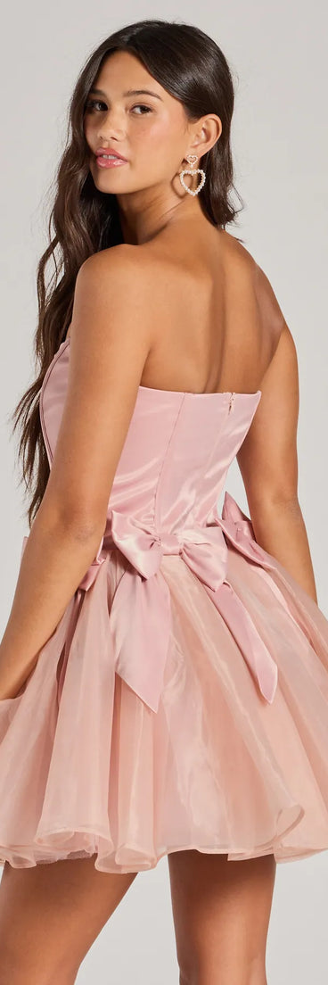 The Jaimie Strapless Corset Bow A-Line Party Dress is a mini dress that will make a statement with its short hemline and on-trend details to have you ready for any event!