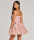 The Jaimie Strapless Corset Bow A-Line Party Dress is a mini dress that will make a statement with its short hemline and on-trend details to have you ready for any event!