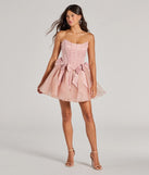The Jaimie Strapless Corset Bow A-Line Party Dress is a mini dress that will make a statement with its short hemline and on-trend details to have you ready for any event!