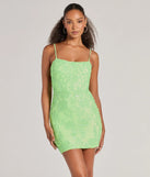 Turn heads in the beaming Tegan Cutout Bodycon Sequin Mini Dress, a stunning lime sequin dress designed to add sparkle and elegance to your next night out or special occasion.