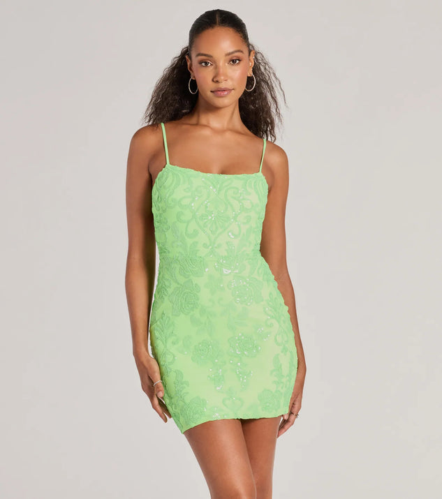 Turn heads in the beaming Tegan Cutout Bodycon Sequin Mini Dress, a stunning lime sequin dress designed to add sparkle and elegance to your next night out or special occasion.
