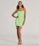 The Tegan Cutout Bodycon Sequin Mini Dress is a dazzling lime sequin dress, perfect for making a bold entrance at any event, from cocktail parties to formal celebrations.