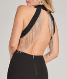 Bring high-impact style to your nightlife in the Nylah Rhinestone Fringe Backless Mini Dress, a bold black club dress made for dancing, parties, and unforgettable nights.