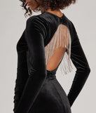 Revamp your 2025 wardrobe with this chic addition, the Salma Rhinestone Fringe Backless Velvet Mini Dress in black, perfect for elevating your style in the new year.