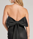 Revamp your 2025 wardrobe with this chic addition, the Reese Woven Glitter Knit Open-Back Bow Mini Dress in black, perfect for elevating your style in the new year.