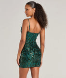 Revamp your 2025 wardrobe with this chic addition, the Amara Sleeveless Sequin Cowl Neck Mini Dress in hunter green, perfect for elevating your style in the new year.