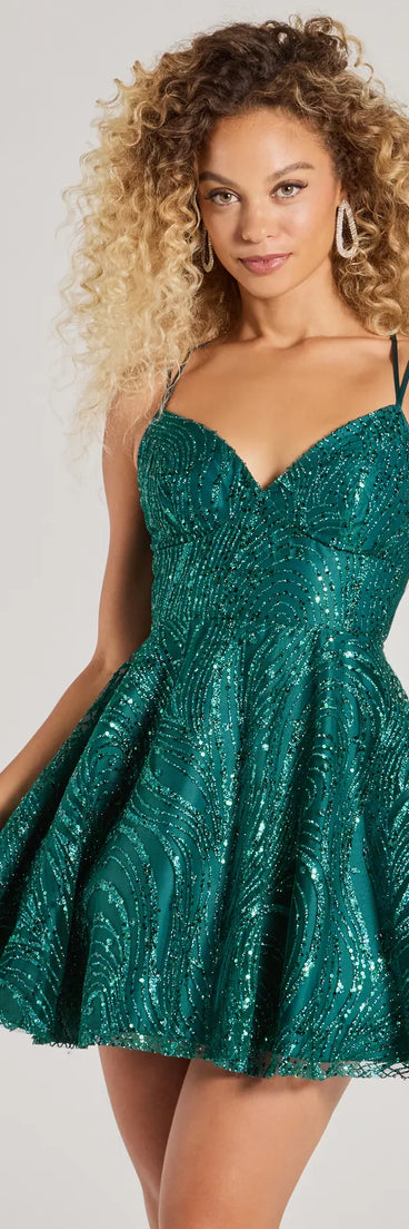 Turn heads in the beaming Linda Lace-Up Glitter Sequin Skater Party Dress, a stunning emerald sequin dress designed to add sparkle and elegance to your next night out or special occasion.